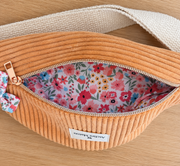 Banane enfant Marta en velours orange clair intérieur fleuri