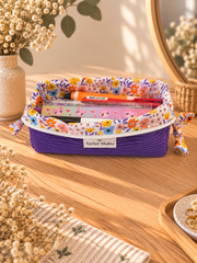 Petite trousse Plume en velours fuchsia à motif plumes, ouverte