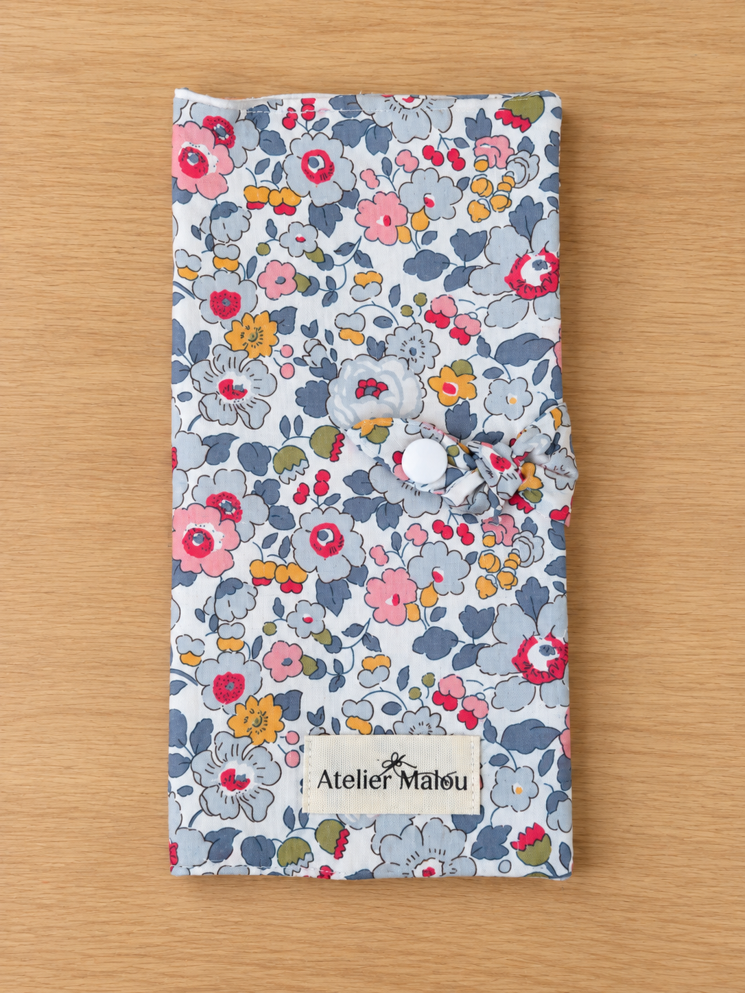 Protège carnet de santé Blue Garden en tissu fleuri bleu et rose